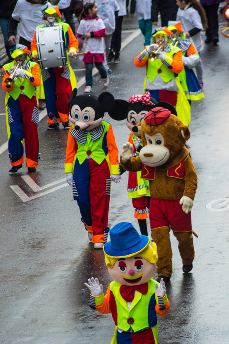 Mickey, Minnie, a monkey, a boy and a band